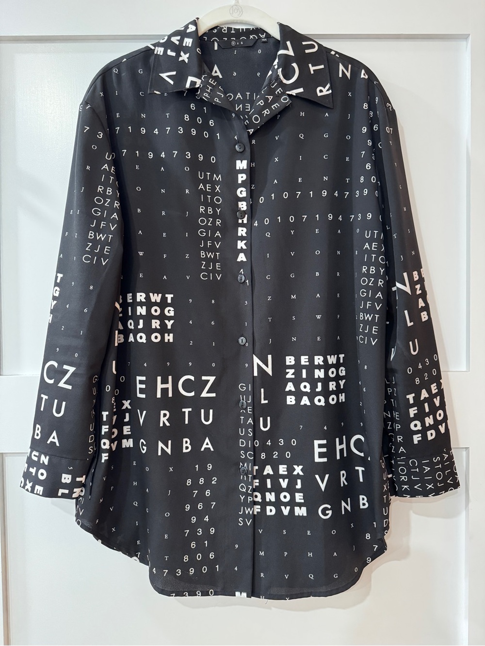 Black & white women’s oversized button-up shirt, size XS/S